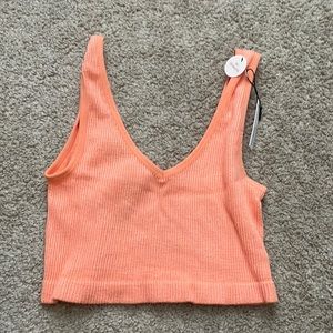 Bright orange seamless ribbed crop top